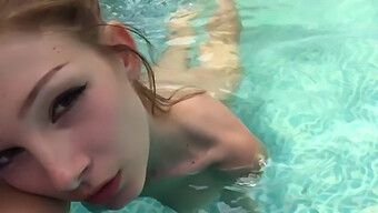 A Girl Pleasures Herself In The Pool