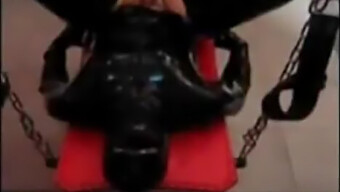 Mistress Dominates Latex-Clad Strapon Slave